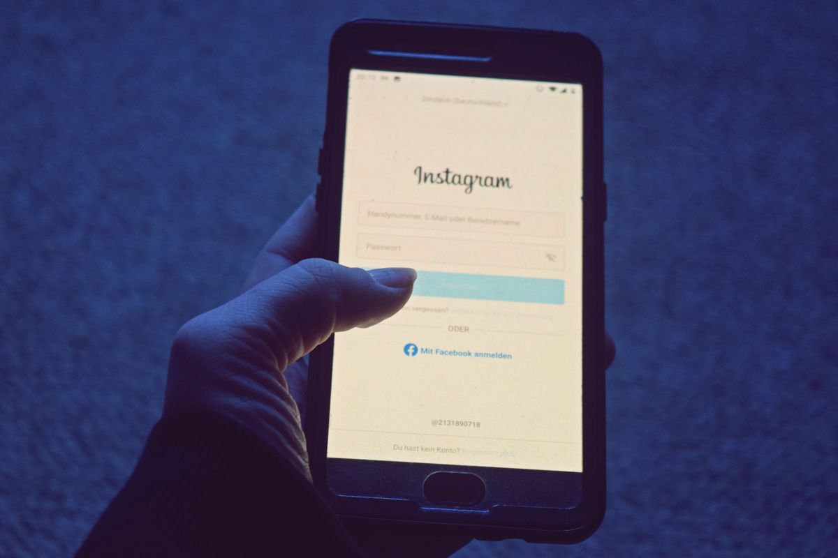 A creator updating her profile and reviewing photos on a phone